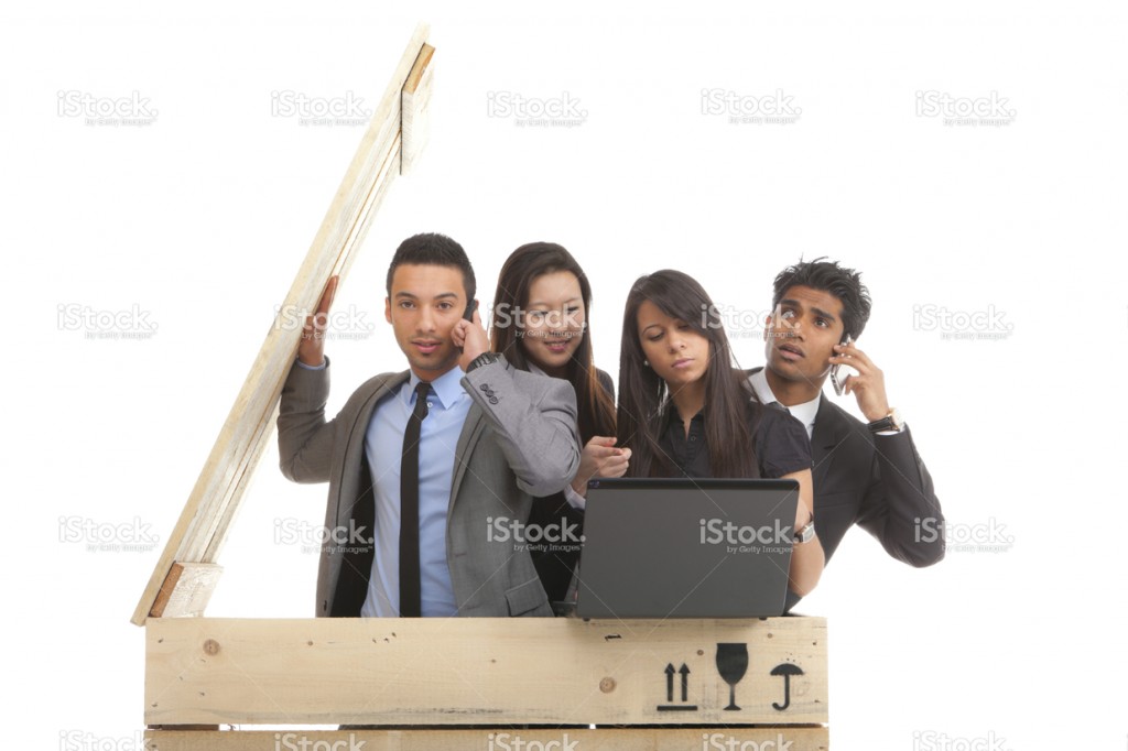 stock-photo-16676207-busy-young-business-people-in-box