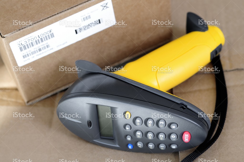 stock-photo-9054500-inventory-barcode-scanner-and-box-with-bar-code-label